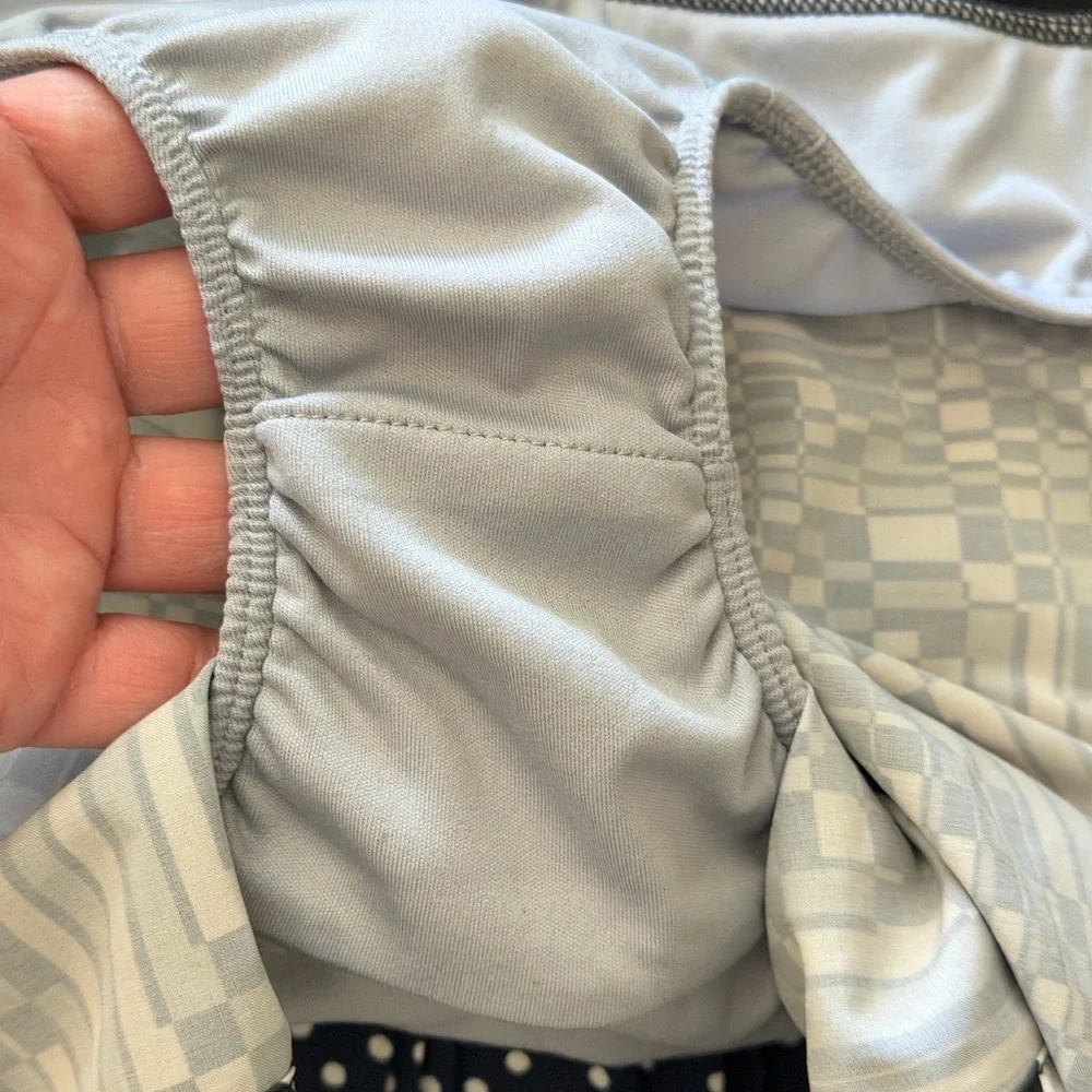 Nike women's running shorts in a gray and black geometric pattern. medium